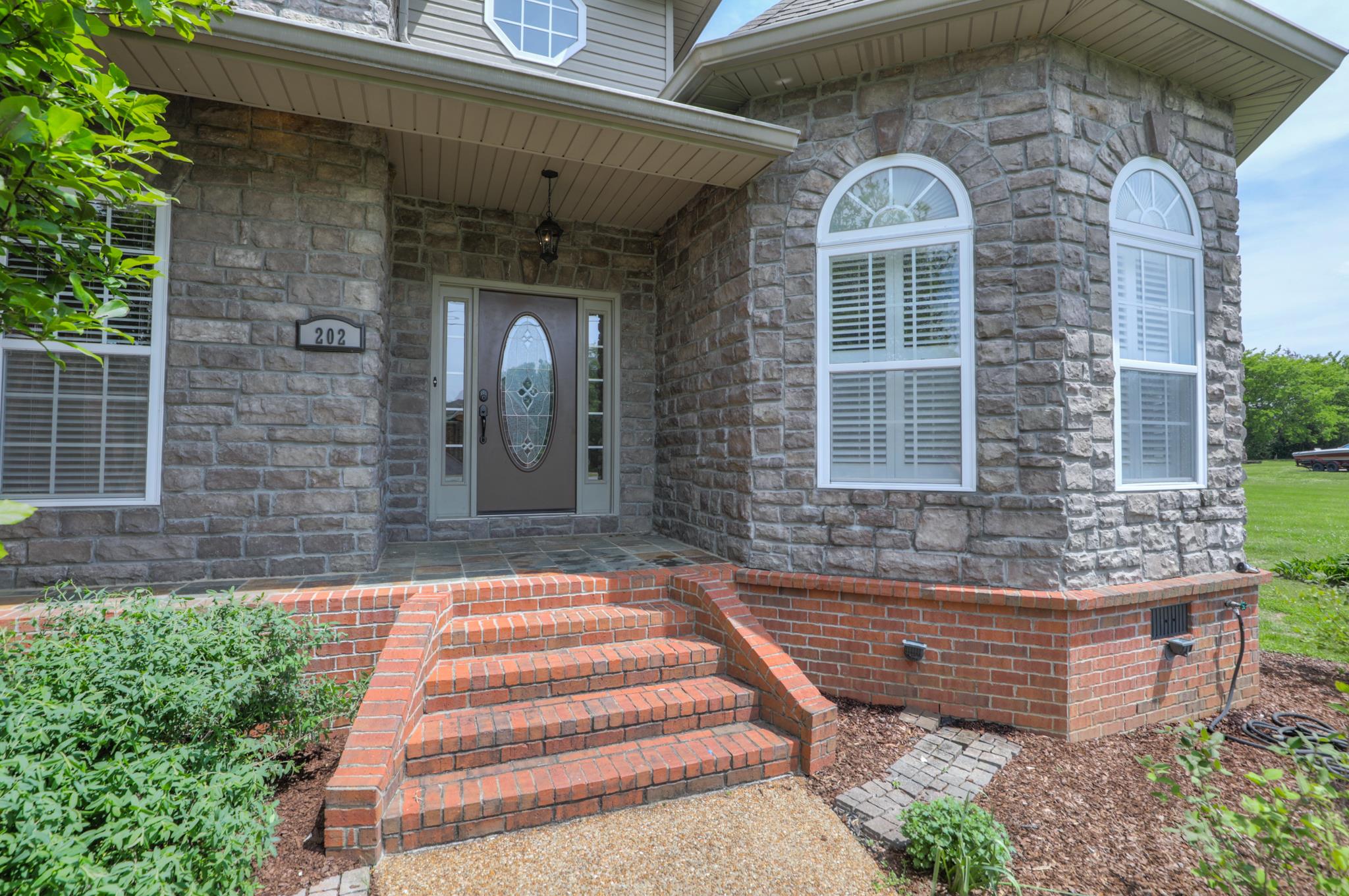 202 Ridgewater Way Mount Juliet, TN 37122 - Photo 2 of 30 a front view of a house having yard