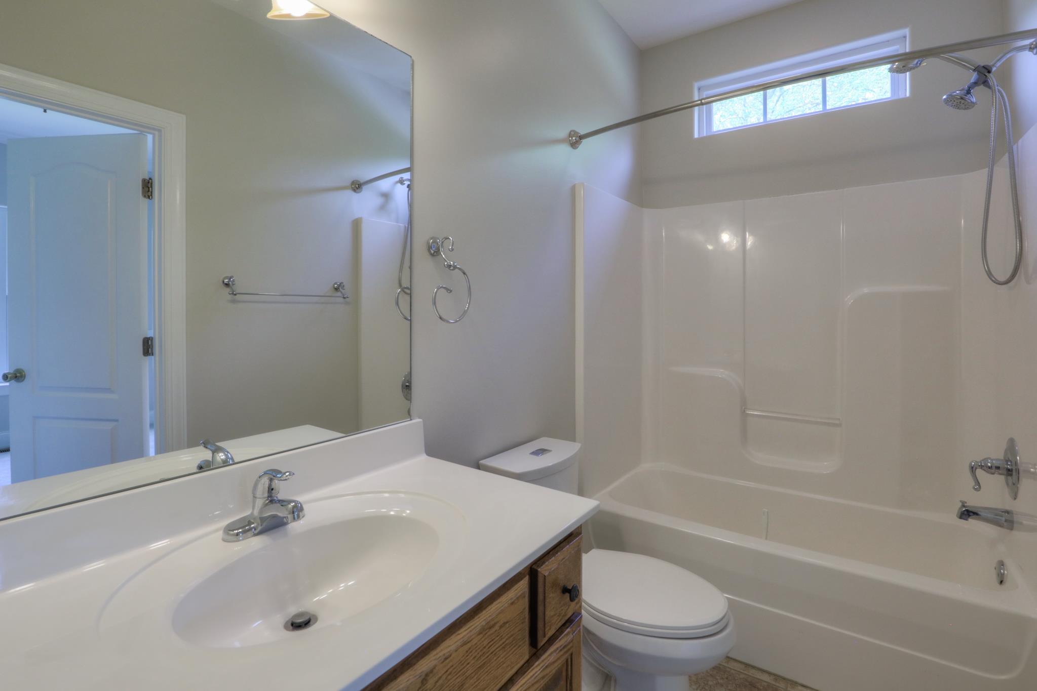 202 Ridgewater Way Mount Juliet, TN 37122 - Photo 28 of 30 a bathroom with a sink a toilet and shower
