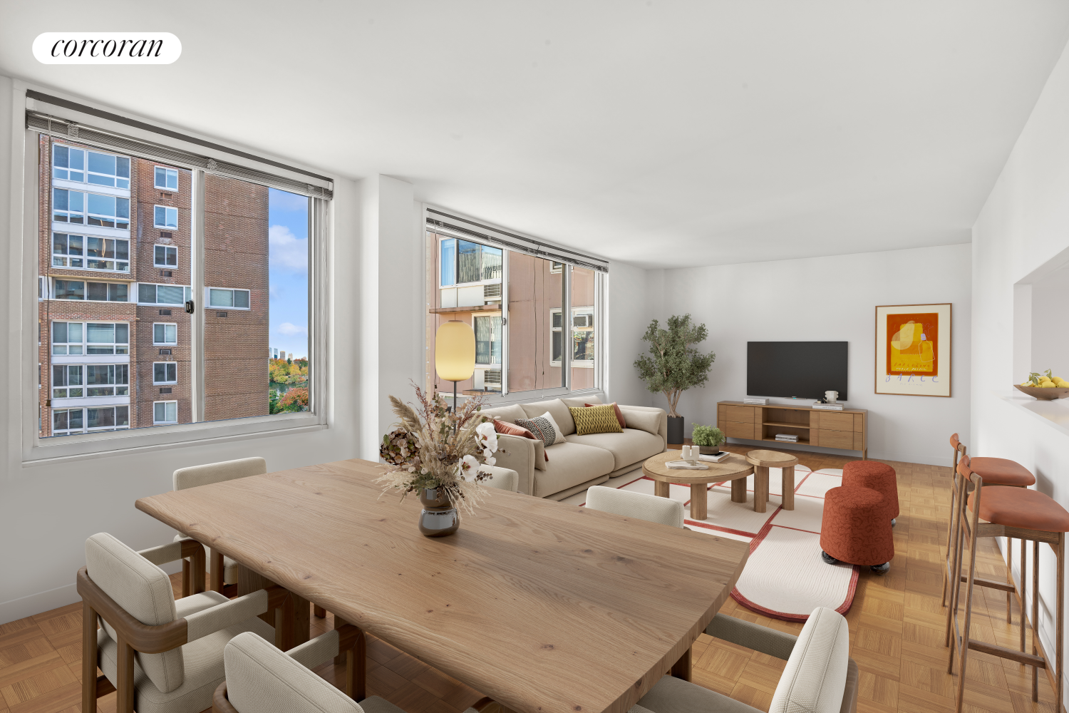 a living room with furniture and a flat screen tv