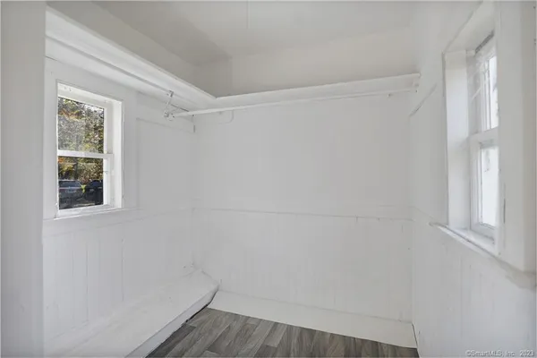 a view of small space with racks on the wall
