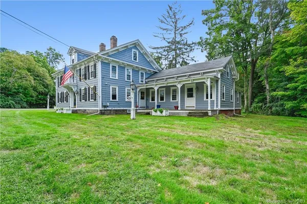 front view of a house with a yard