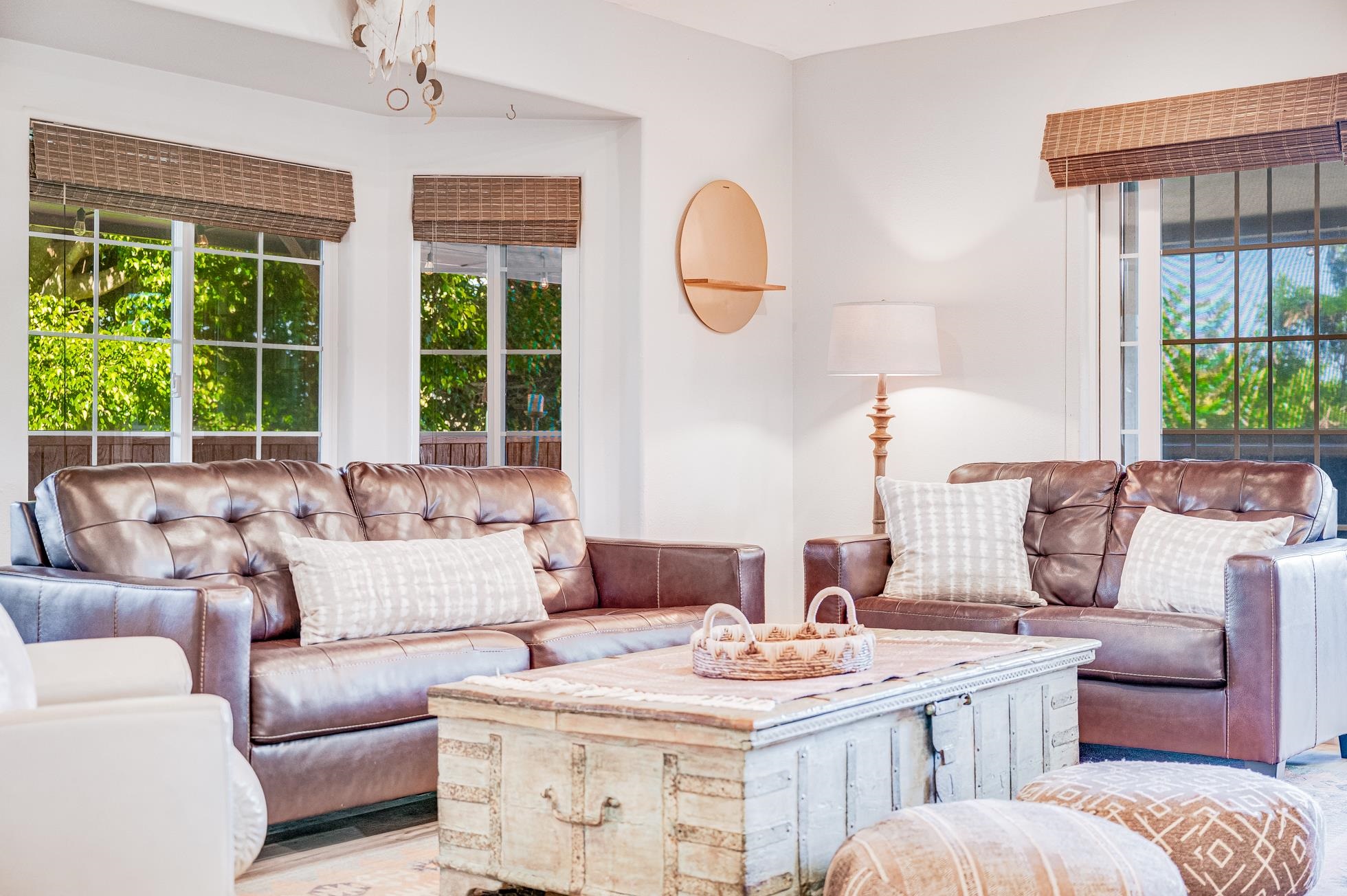 951 Kokomo Road Haiku, HI 96708 - Photo 14 of 50 a living room with furniture and a large window