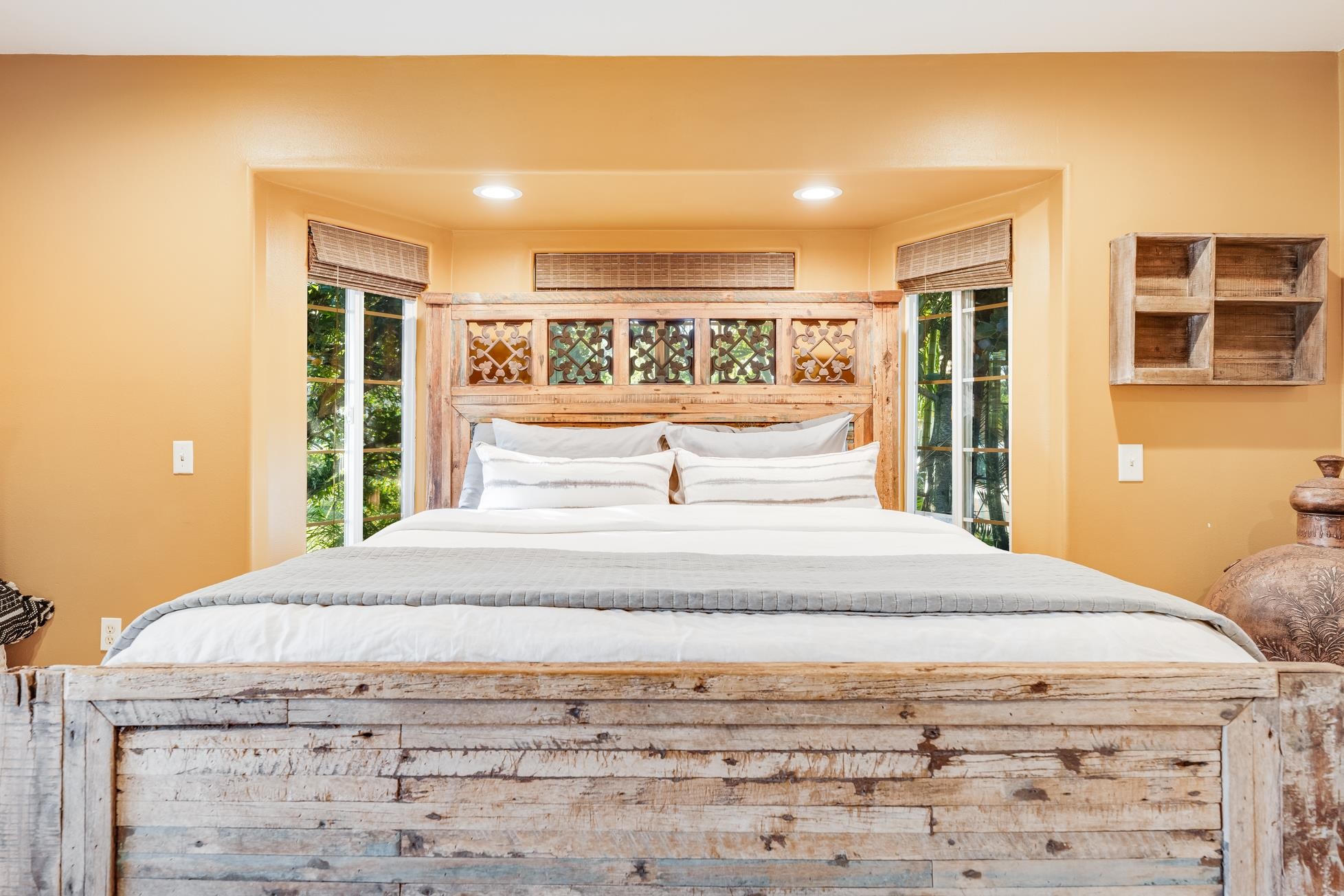 951 Kokomo Road Haiku, HI 96708 - Photo 19 of 50 a bedroom with a bed and a window