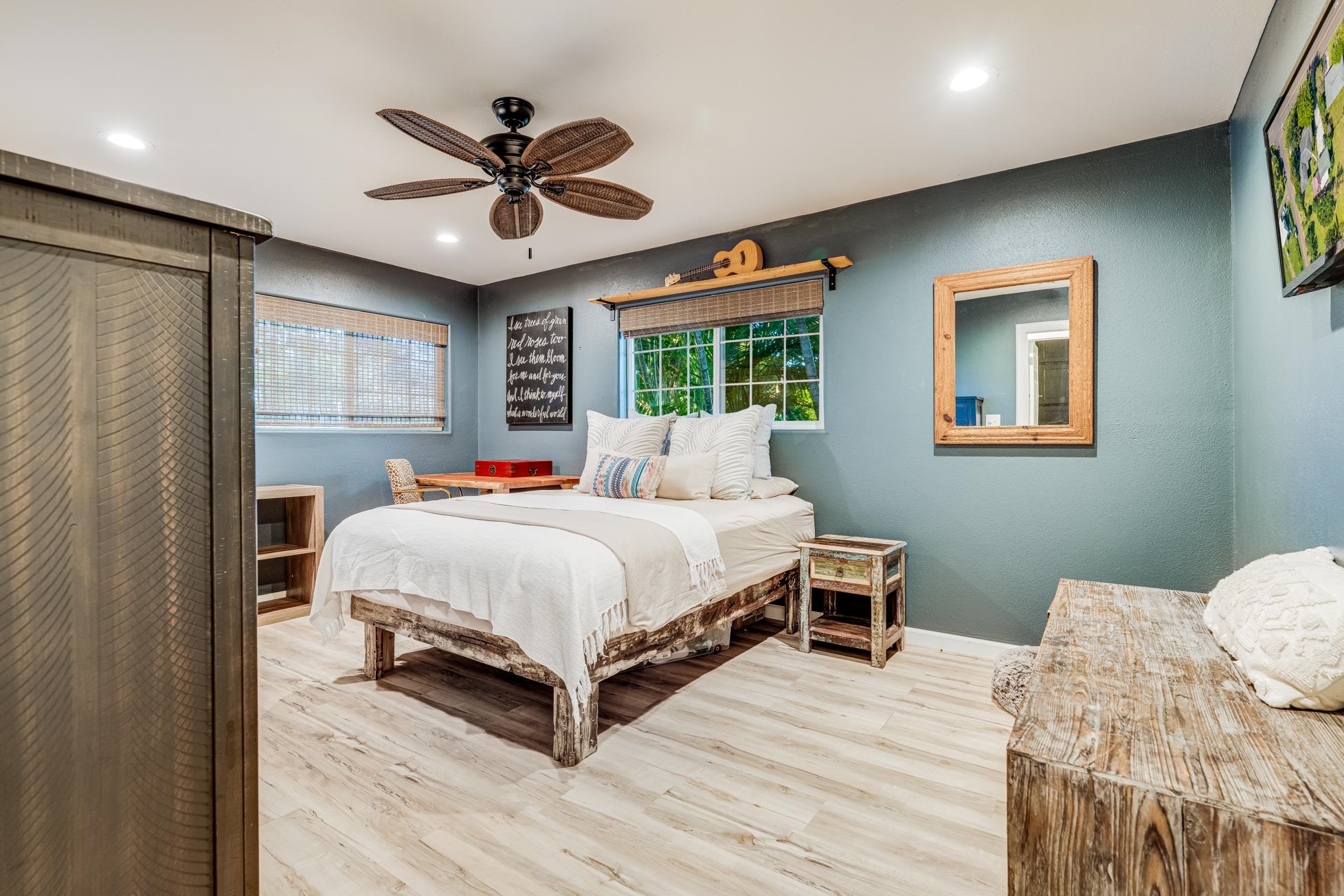 951 Kokomo Road Haiku, HI 96708 - Photo 26 of 50 a bedroom with a bed and window
