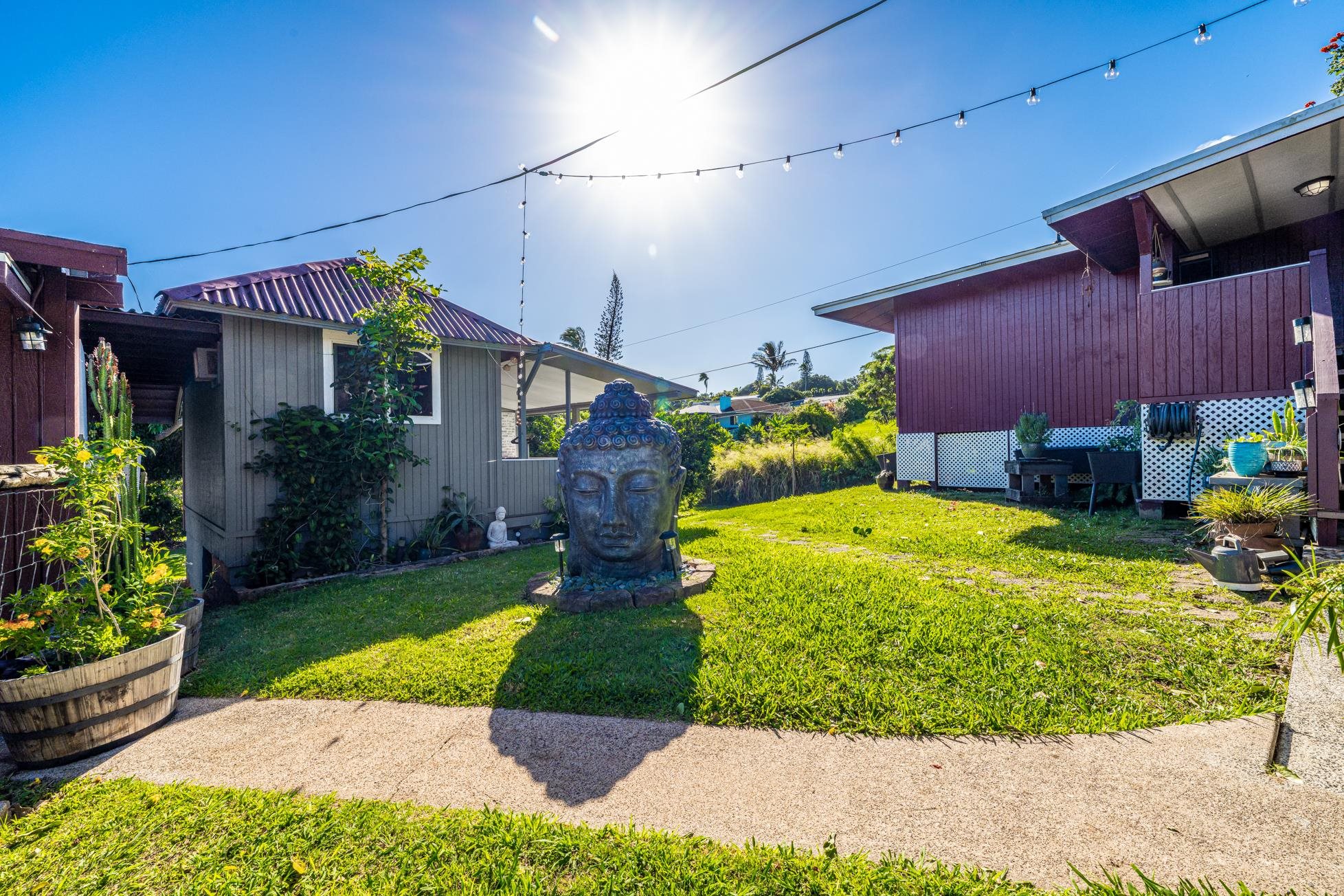 951 Kokomo Road Haiku, HI 96708 - Photo 32 of 50 a bathroom with a sink and garden
