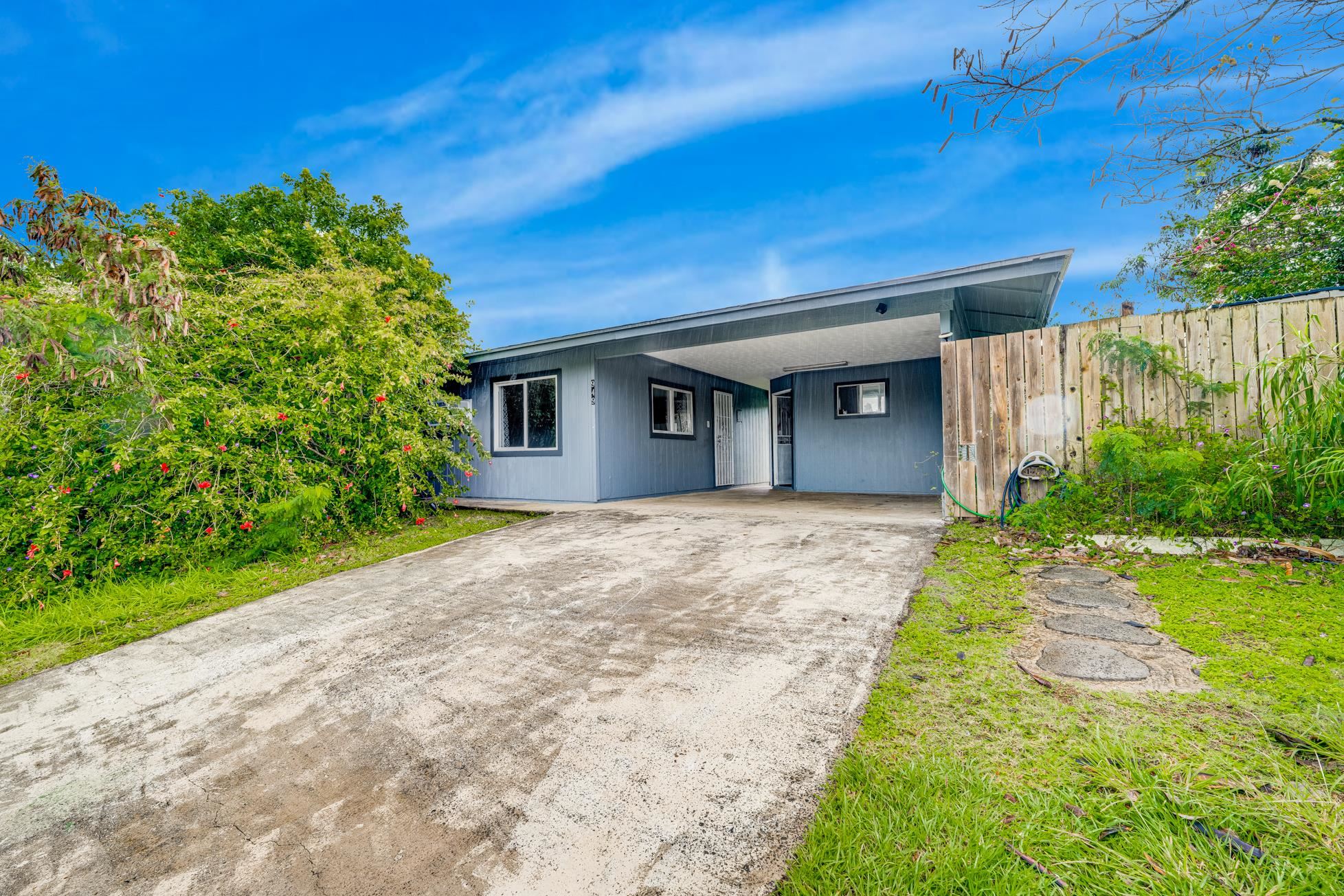 951 Kokomo Road Haiku, HI 96708 - Photo 37 of 50 a view of a house with a yard