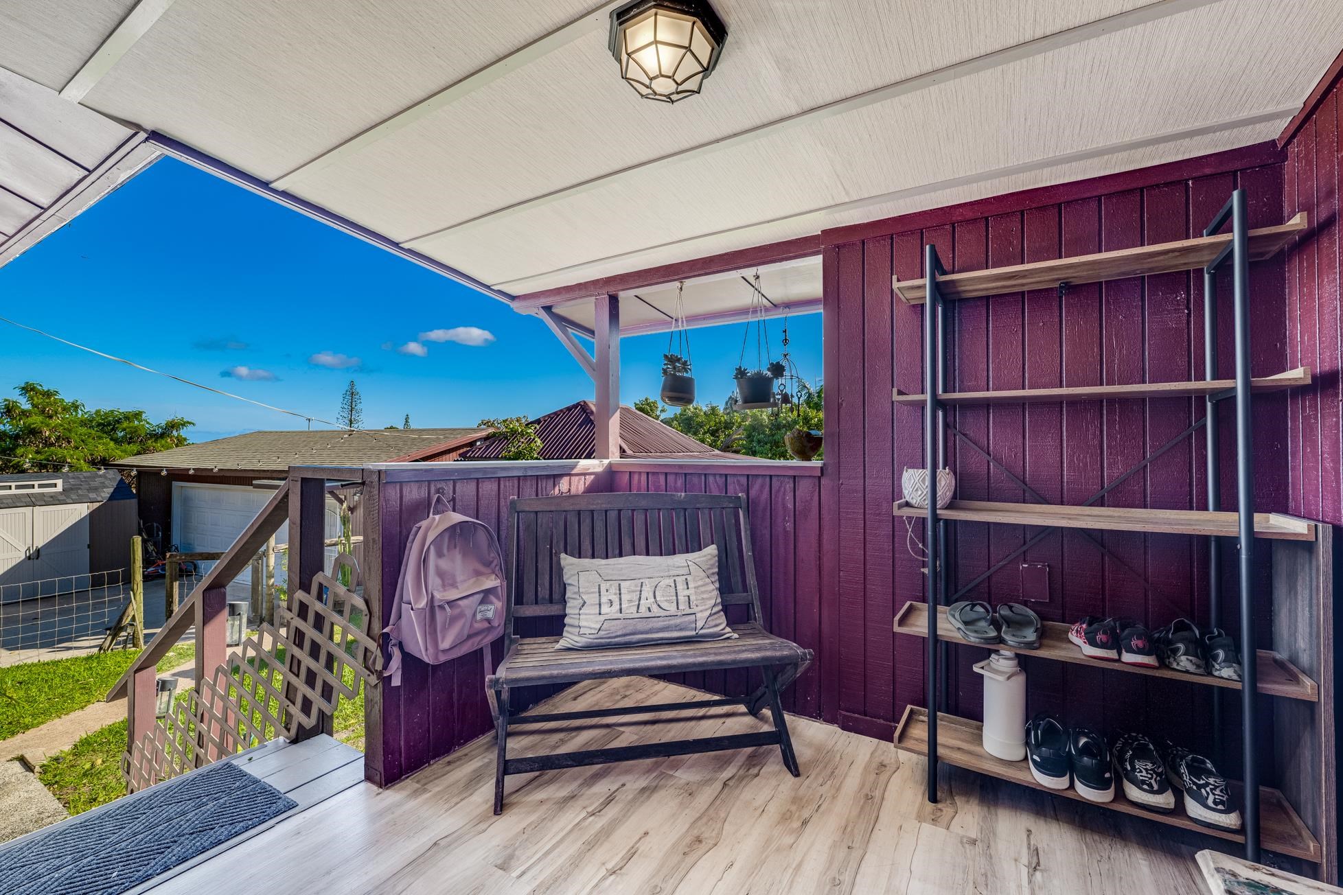951 Kokomo Road Haiku, HI 96708 - Photo 5 of 50 a view of livingroom with furniture and wooden floor