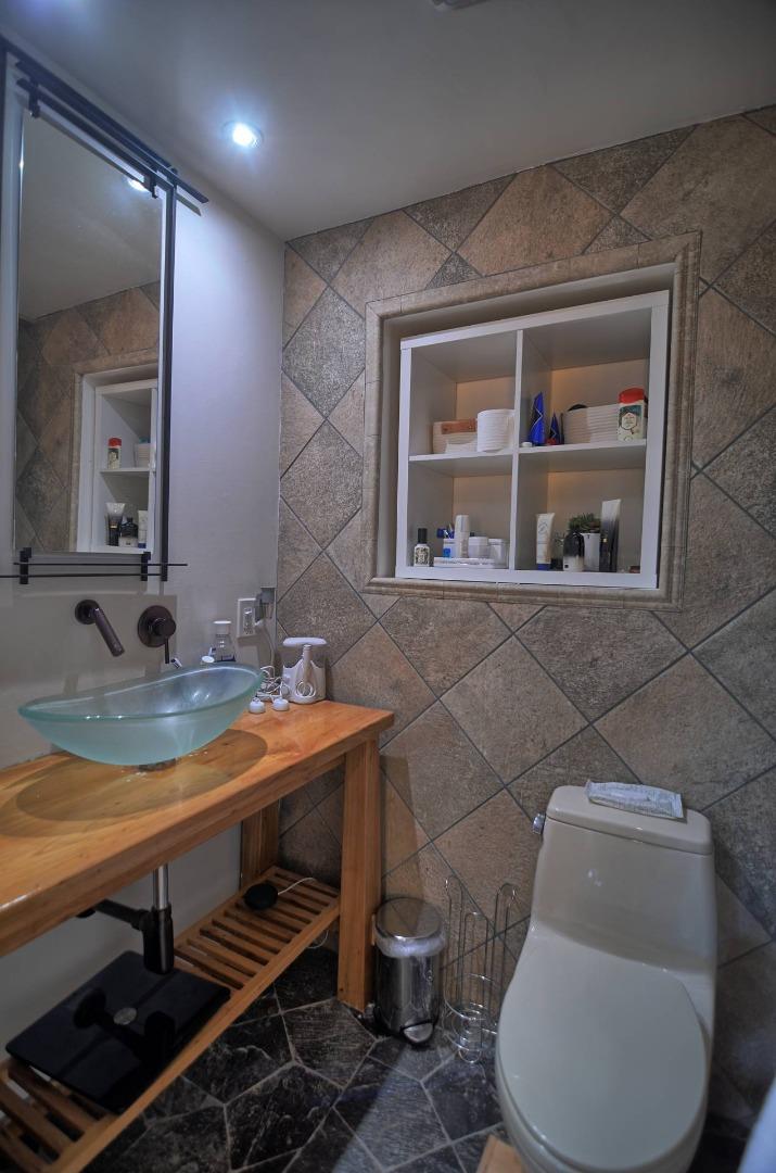 254 Swett Road Woodside, CA 94062 - Photo 15 of 26 a bathroom with a toilet and a sink