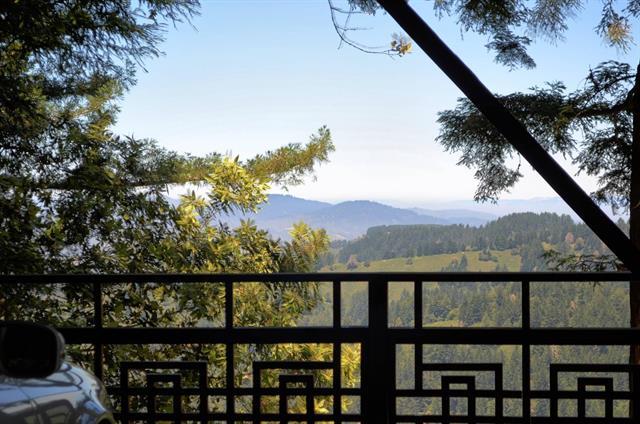 254 Swett Road Woodside, CA 94062 - Photo 22 of 26 a view of a city from a balcony