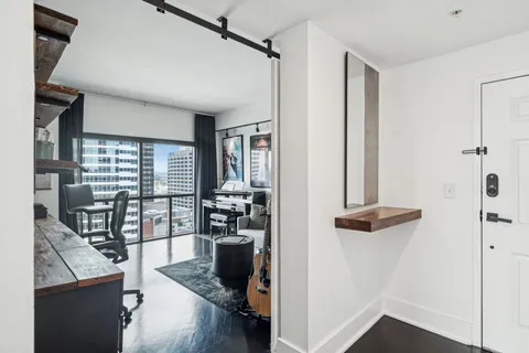 a view of a living room with furniture