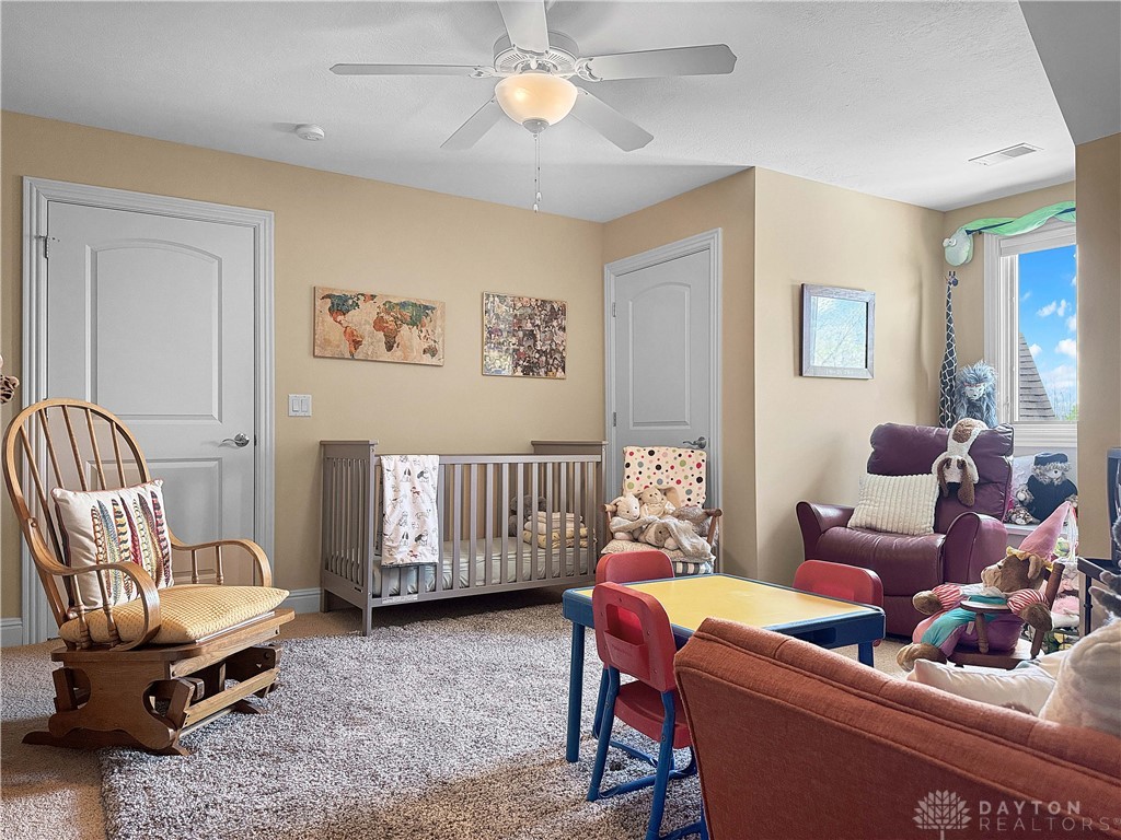 4096 Middle Urbana Road Urbana, OH 43078 - Photo 73 of 96 This cozy bedroom features a crib, ensuring comfort for the newest family member.
