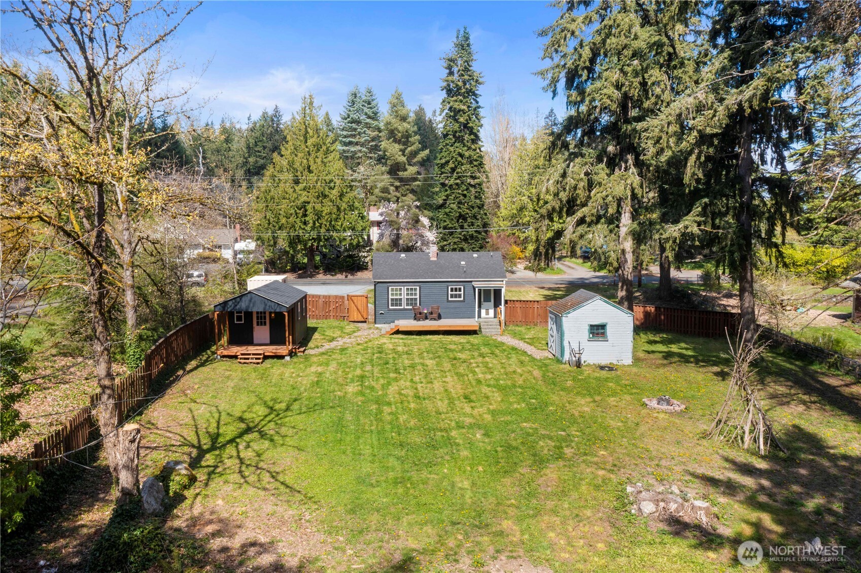 11716 48th Street East Edgewood, WA 98372 - Photo 21 of 29 a view of a house with a yard