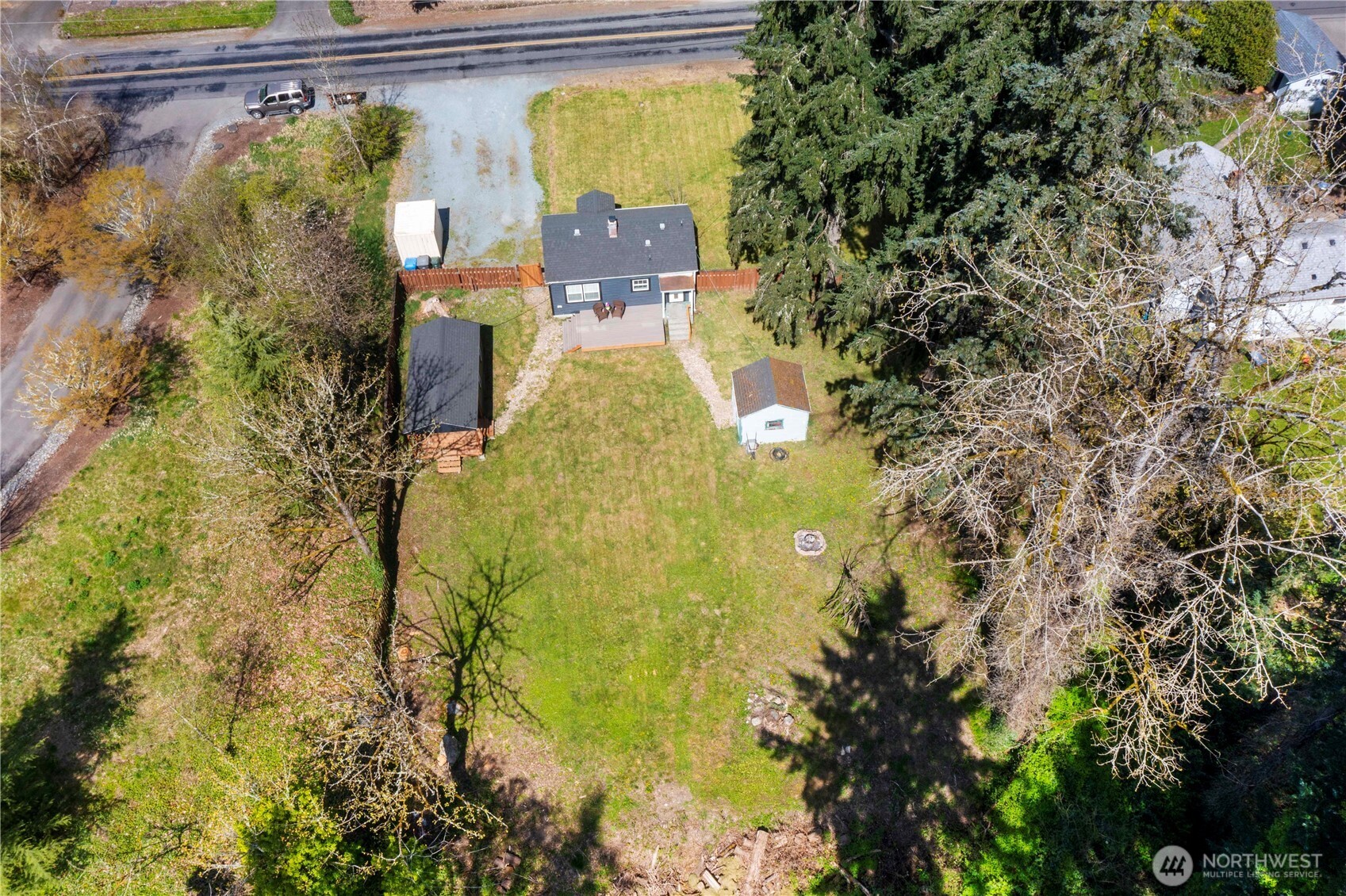 11716 48th Street East Edgewood, WA 98372 - Photo 24 of 29 a aerial view of a house with a yard