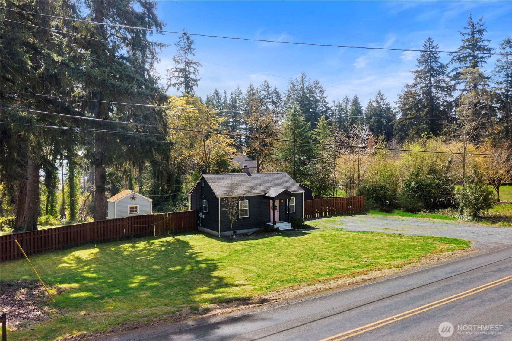 11716 48th Street East Edgewood, WA 98372 - Photo 28 of 29 a view of a swimming pool with a patio