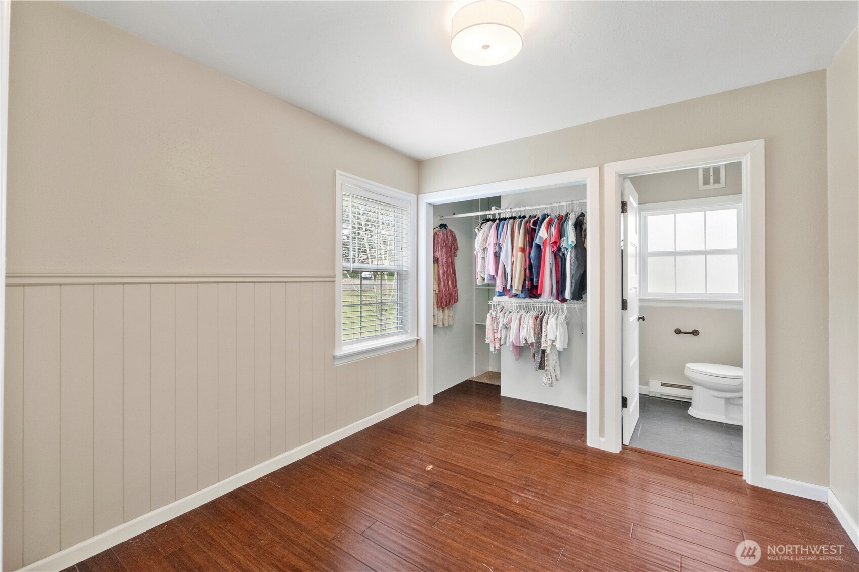 11716 48th Street East Edgewood, WA 98372 - Photo 10 of 29 a view of a room with wooden floor and bathroom