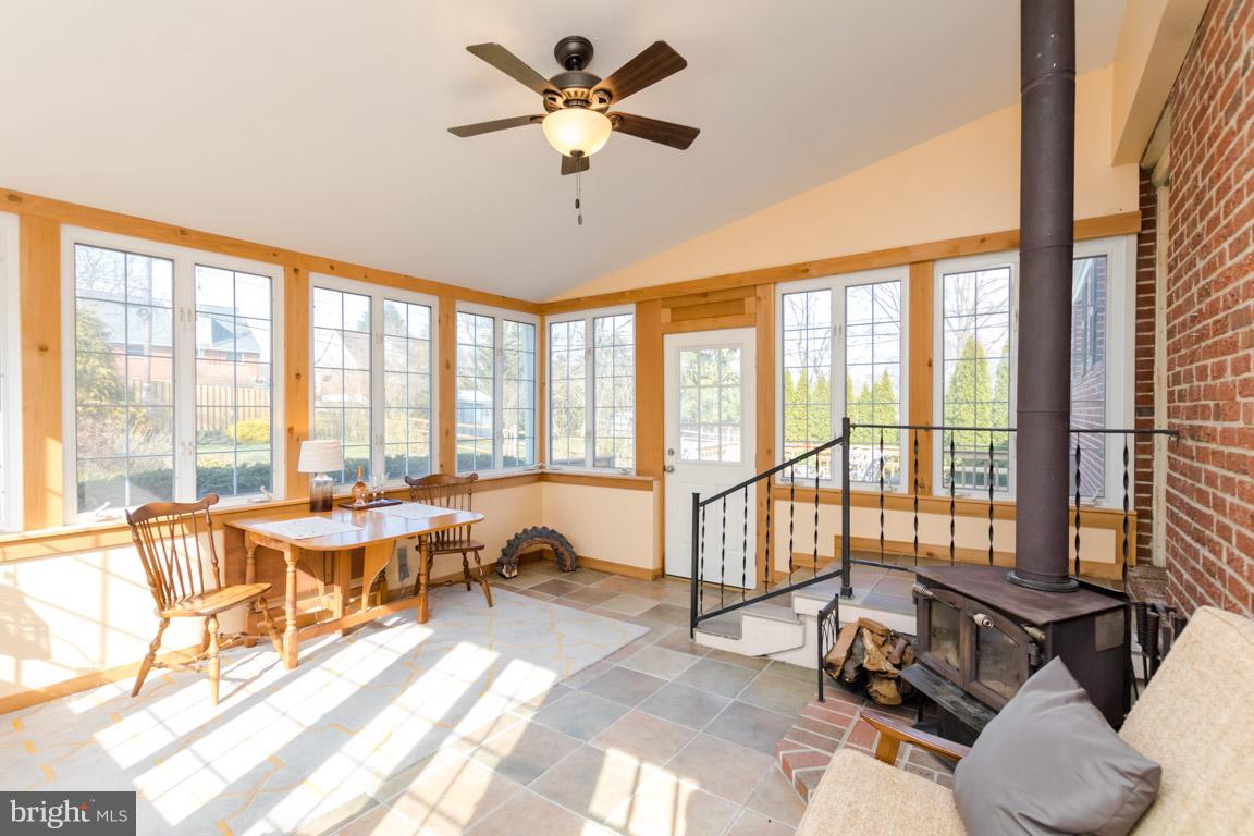 22 Hathaway Road Lutherville-Timonium, MD 21093 - Photo 6 of 30 Amazing sunroom with wood stove!