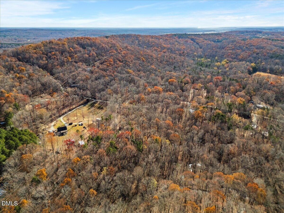 407 Mountain Brook Road Rougemont, NC 27572 - Photo 12 of 23 an aerial view of house with yard and mountain view in back