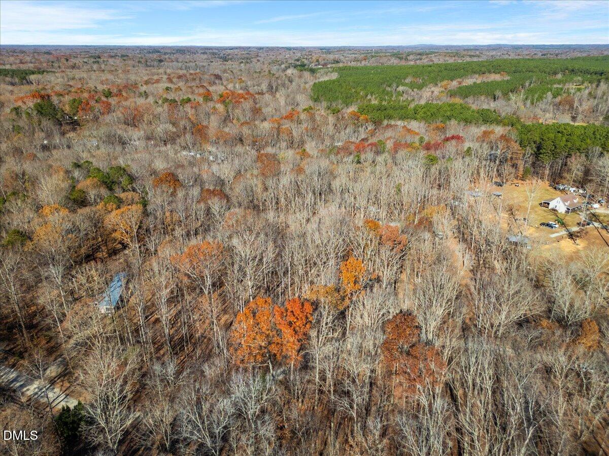 407 Mountain Brook Road Rougemont, NC 27572 - Photo 8 of 23 a view of an outdoor space and a lake view