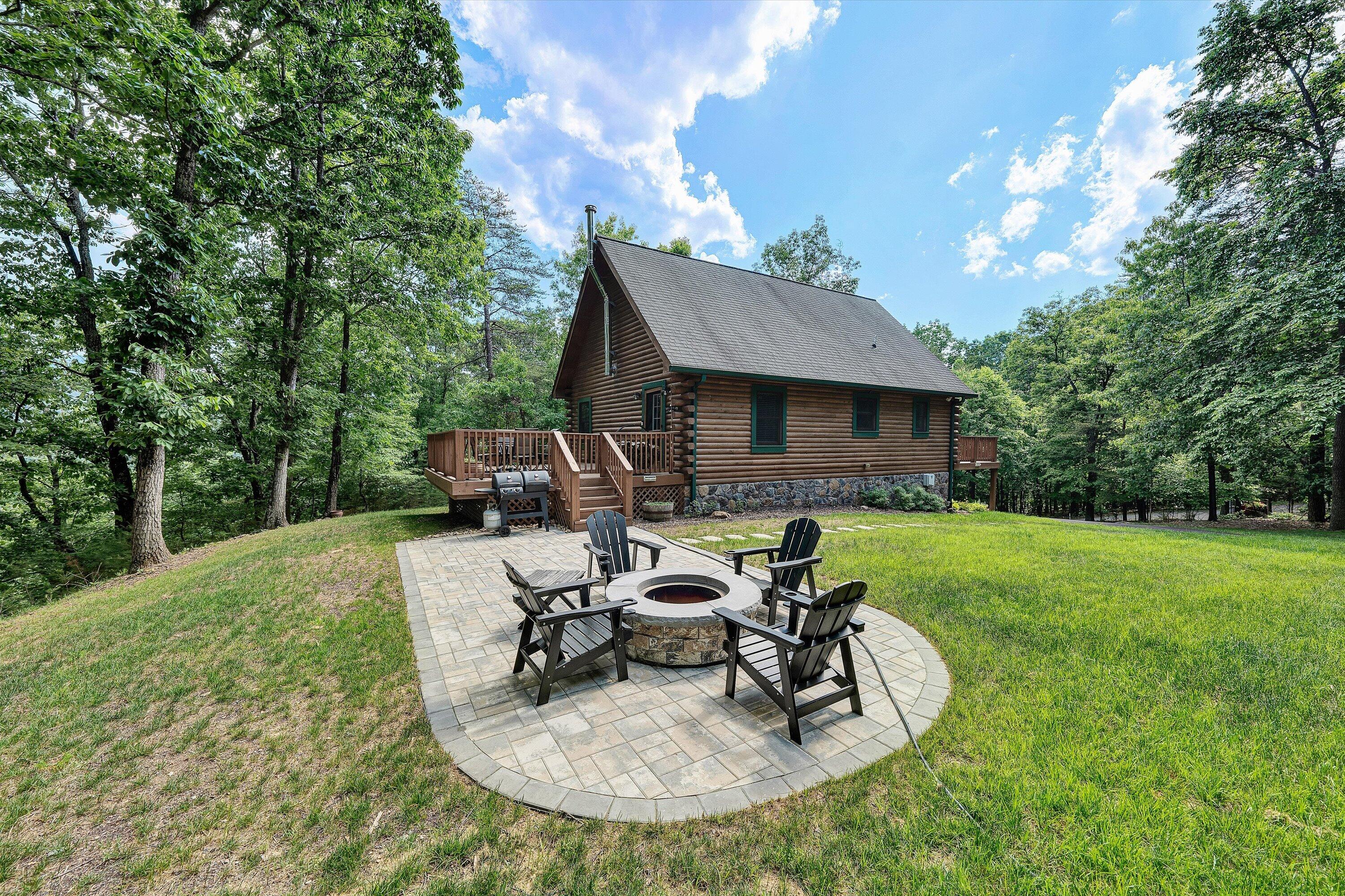 6211 Hillcrest Road Salem, VA 24153 - Photo 31 of 36 a view of a house with backyard sitting area and garden