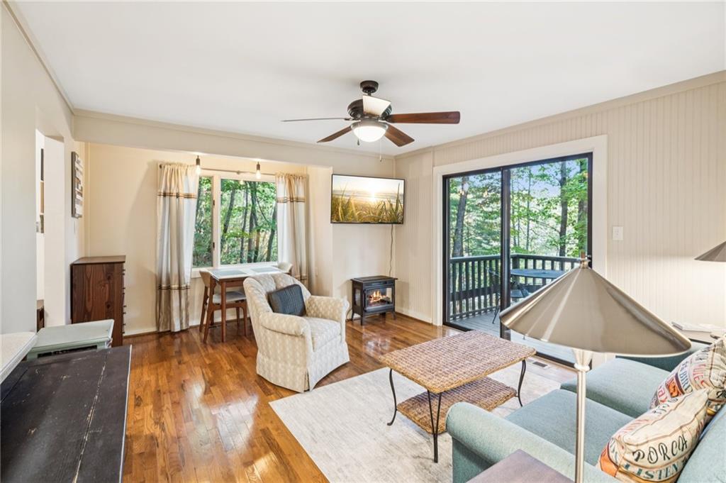 116 Sconti Ridge, Unit 419B Jasper, GA 30143 - Photo 11 of 17 a living room with furniture a table and chairs