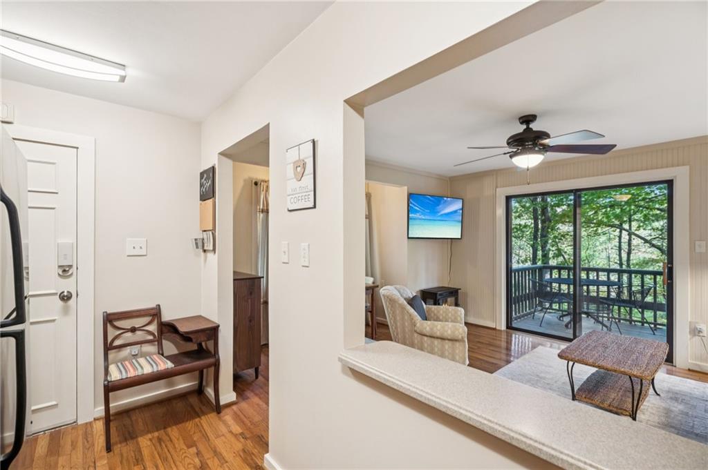 116 Sconti Ridge, Unit 419B Jasper, GA 30143 - Photo 9 of 17 a living room with furniture and a large window