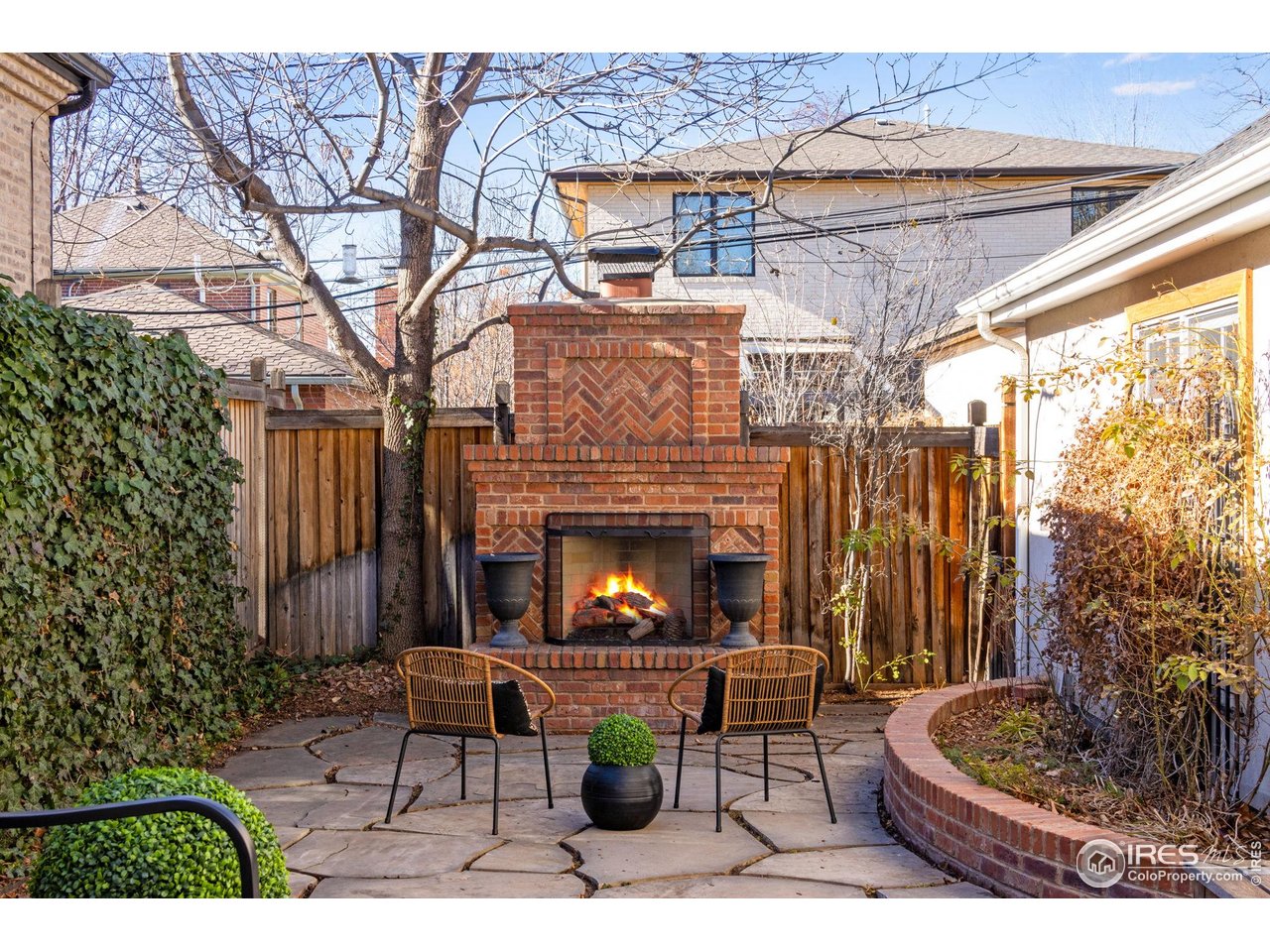 707 South Fillmore Street Denver, CO 80209 - Photo 12 of 47 a view of a patio with a table and chairs