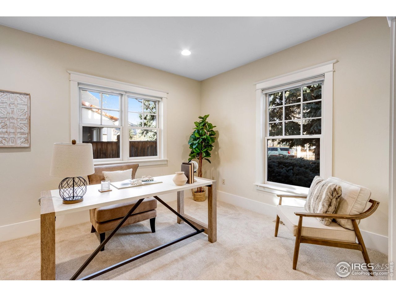 707 South Fillmore Street Denver, CO 80209 - Photo 17 of 47 a living room with furniture and window