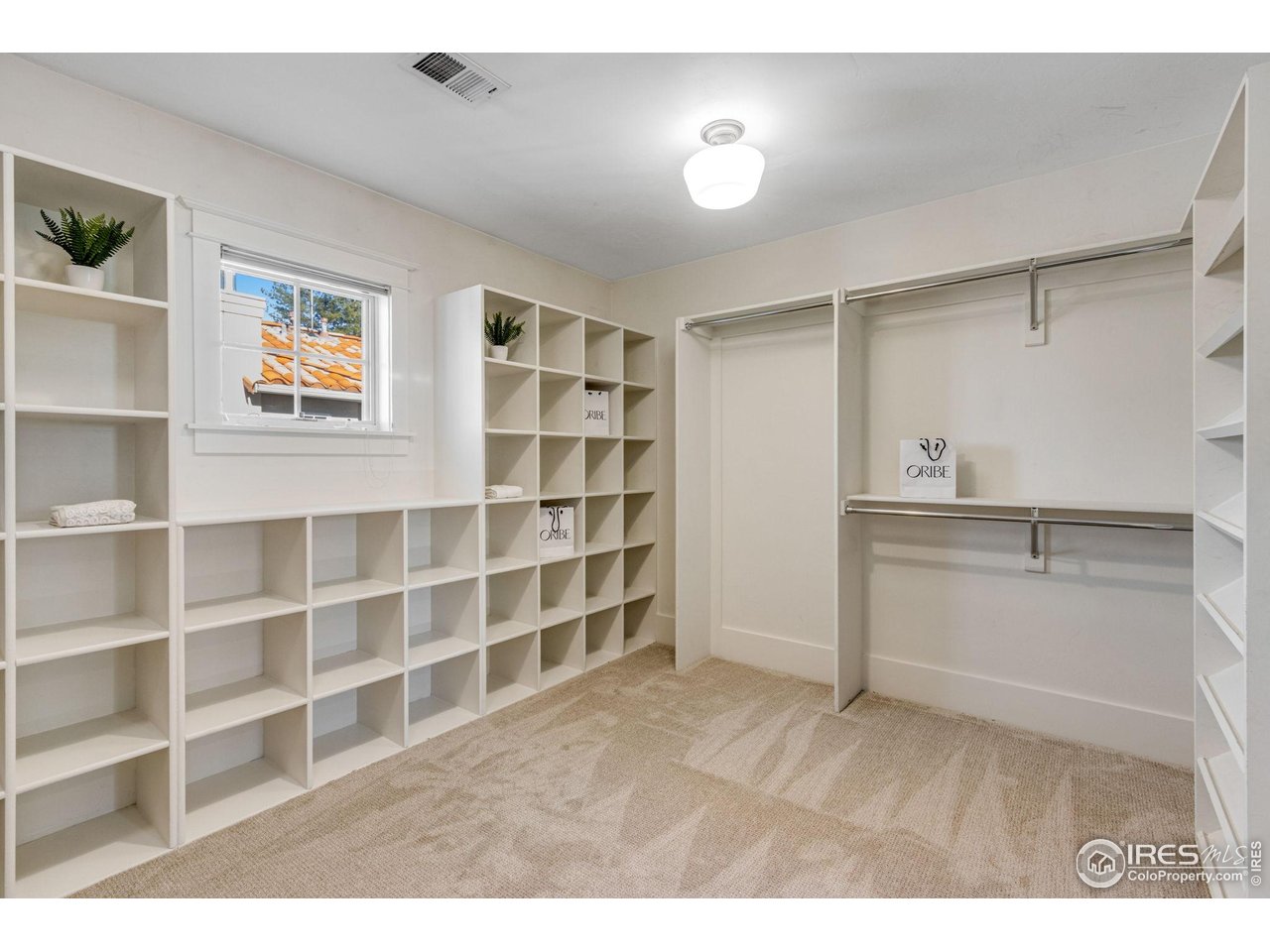 707 South Fillmore Street Denver, CO 80209 - Photo 35 of 47 a view of an empty room with empty shelves