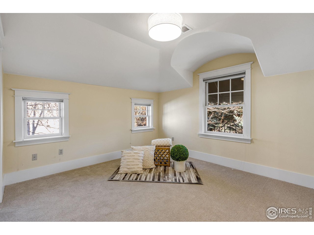 707 South Fillmore Street Denver, CO 80209 - Photo 39 of 47 a living room with furniture and a window