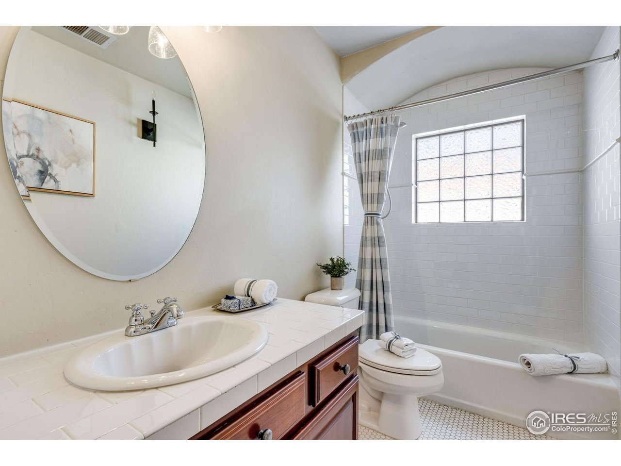 707 South Fillmore Street Denver, CO 80209 - Photo 40 of 47 a bathroom with a sink toilet and shower
