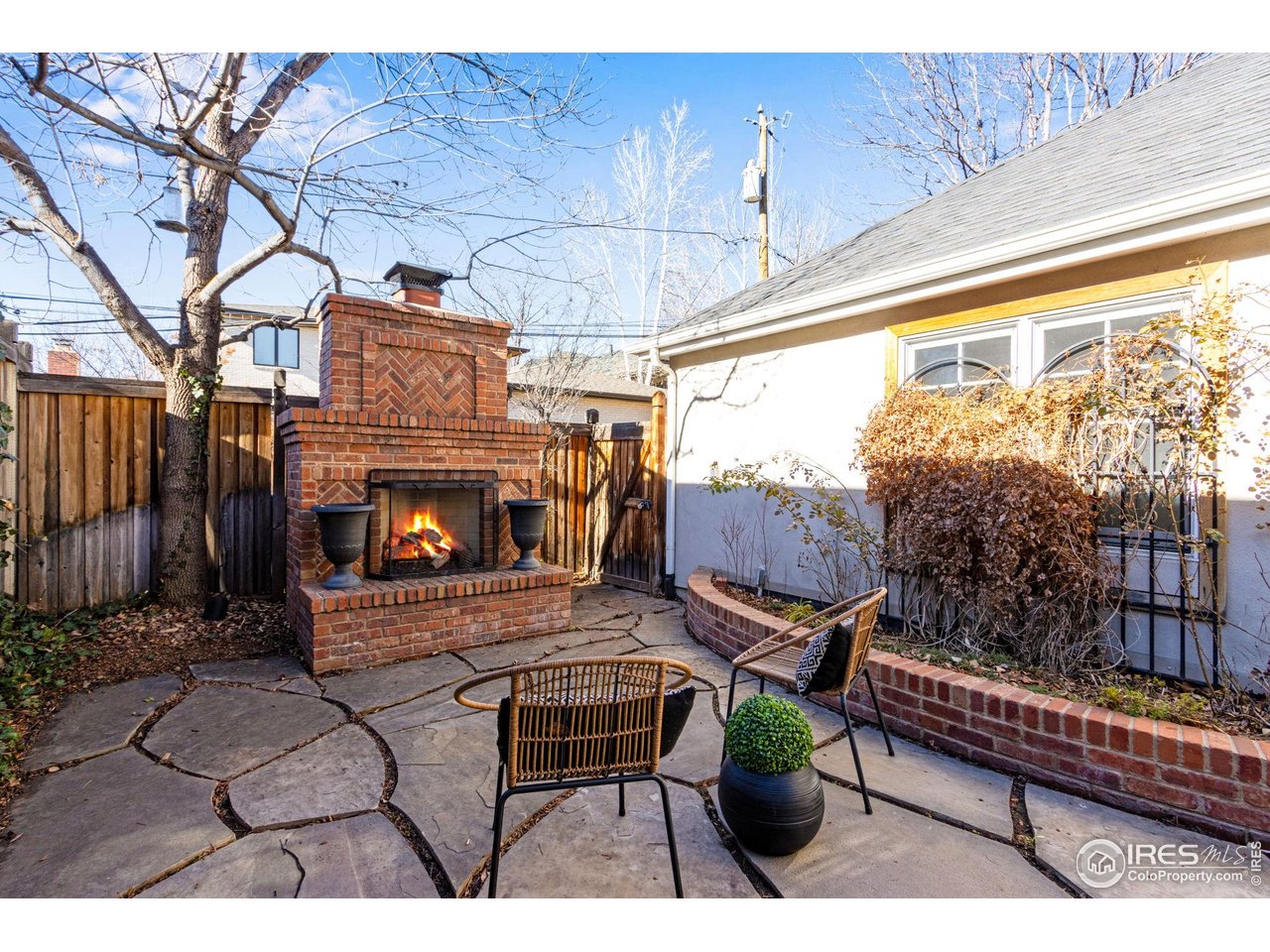 707 South Fillmore Street Denver, CO 80209 - Photo 6 of 47 a view of a chairs and tables in the back yard of the house
