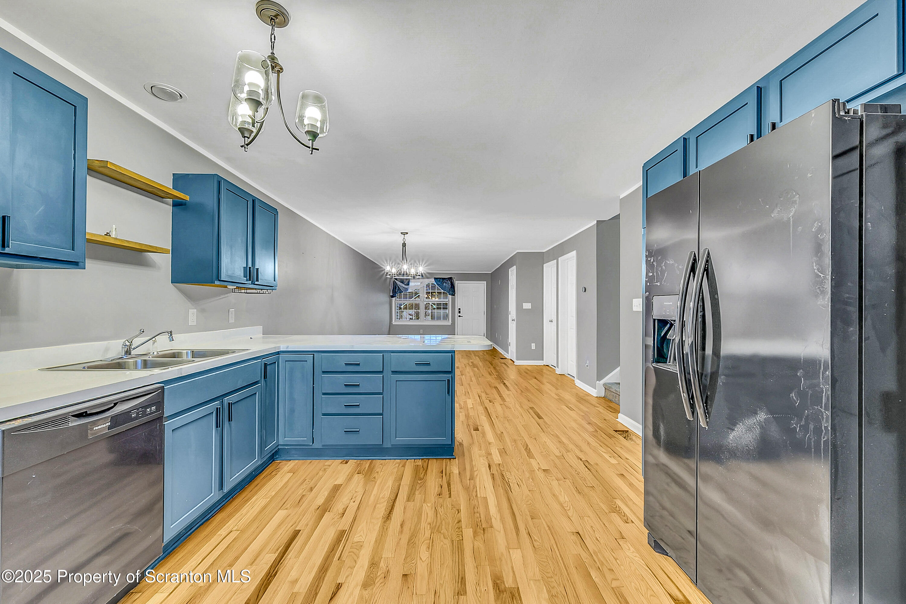14 Fiore Court Duryea, PA 18642 - Photo 12 of 41 a large kitchen with stainless steel appliances granite countertop a refrigerator and a sink