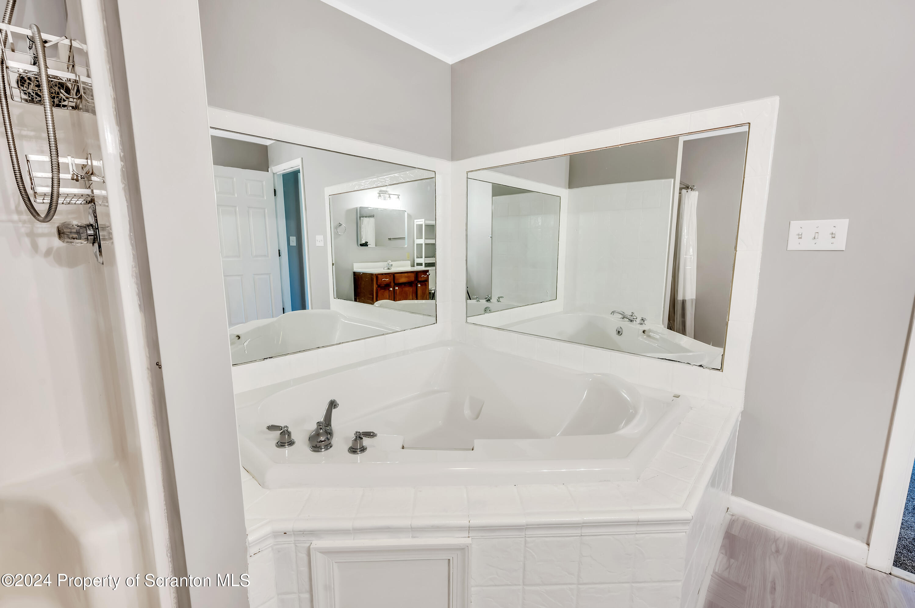 14 Fiore Court Duryea, PA 18642 - Photo 18 of 41 a bathroom with a tub sink and mirror