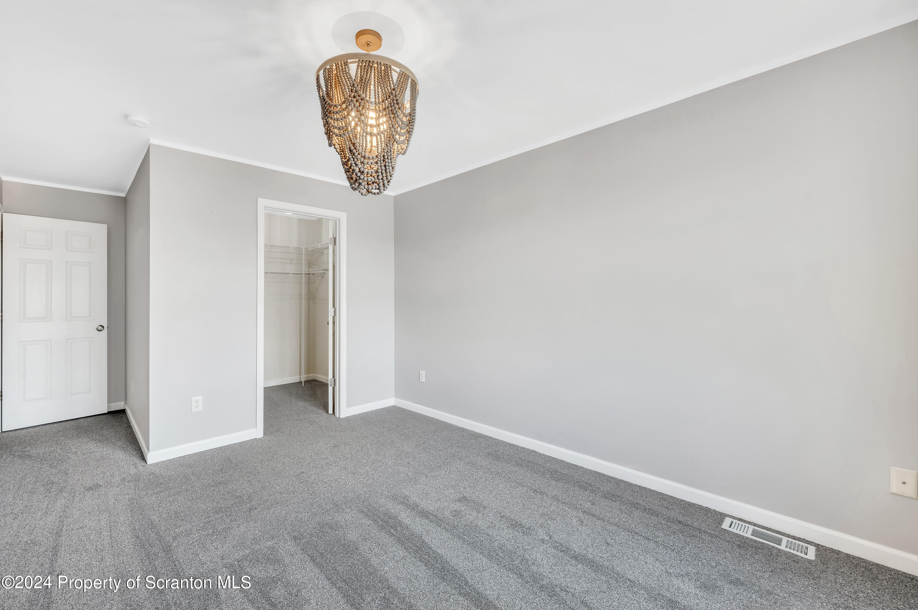 14 Fiore Court Duryea, PA 18642 - Photo 31 of 41 a view of a livingroom with a chandelier