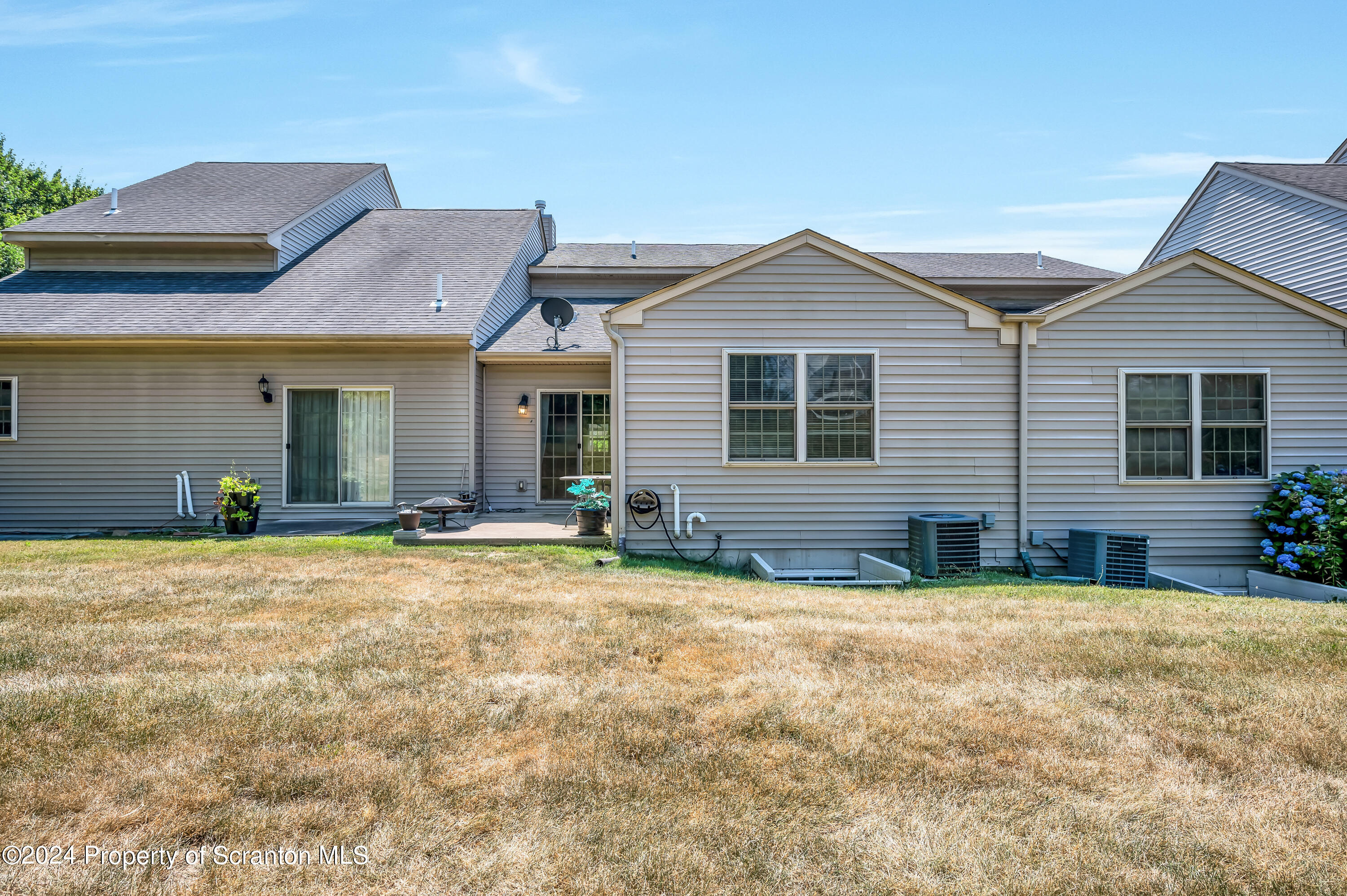 14 Fiore Court Duryea, PA 18642 - Photo 39 of 41 a view of a house with backyard and sitting area