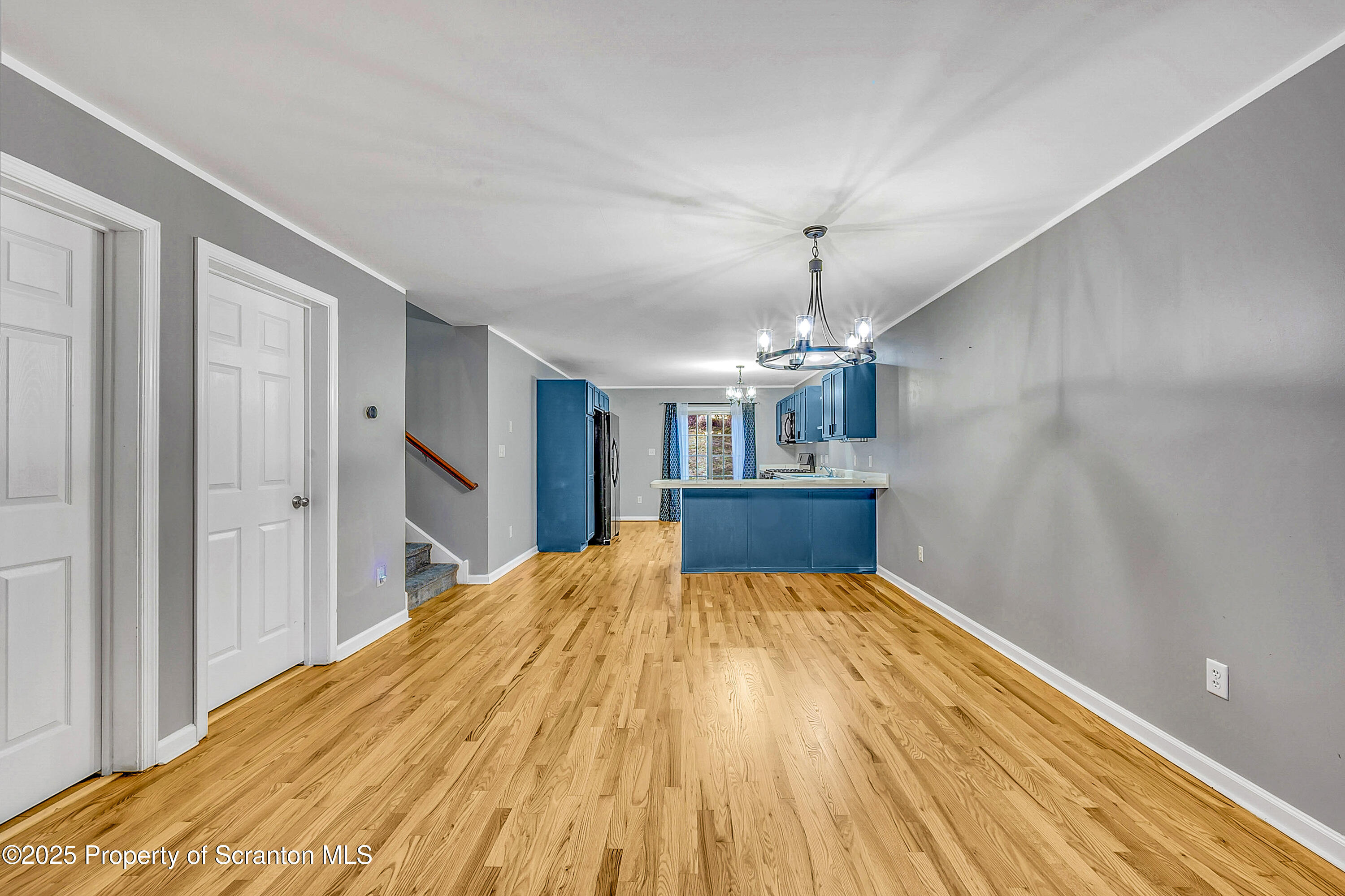 14 Fiore Court Duryea, PA 18642 - Photo 9 of 41 a view of a livingroom with a chandelier
