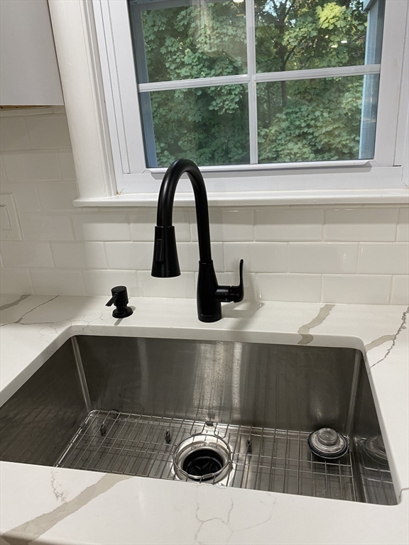 29 Styles Drive Peabody, MA 01960 - Photo 14 of 41 a kitchen with a sink and washing machine