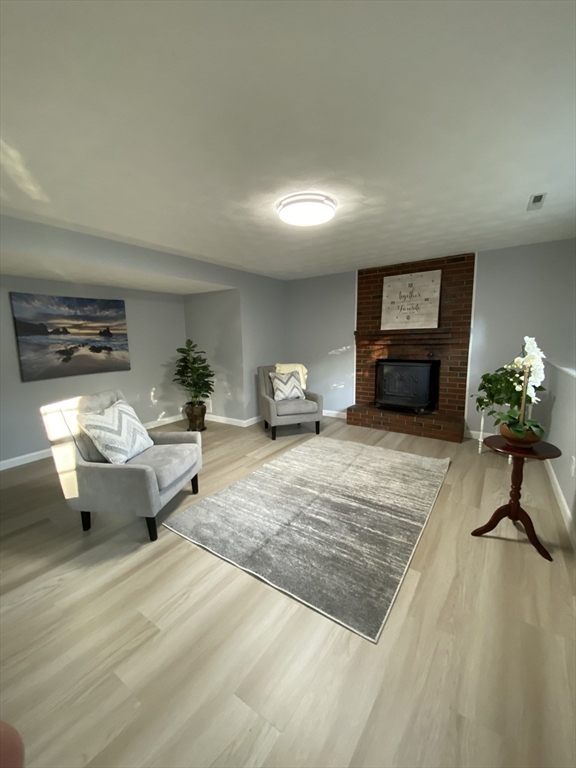 29 Styles Drive Peabody, MA 01960 - Photo 31 of 41 a living room with furniture and a potted plant