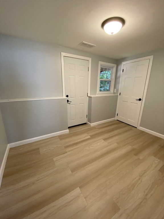 29 Styles Drive Peabody, MA 01960 - Photo 33 of 41 an empty room with a empty space and windows