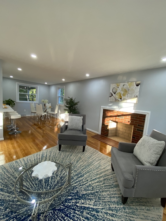 29 Styles Drive Peabody, MA 01960 - Photo 41 of 41 a living room with furniture and a dining table