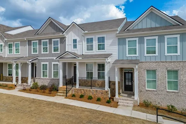 front view of a house with a yard