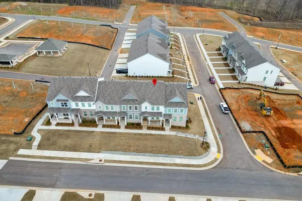 an outdoor space with swimming pool and seating