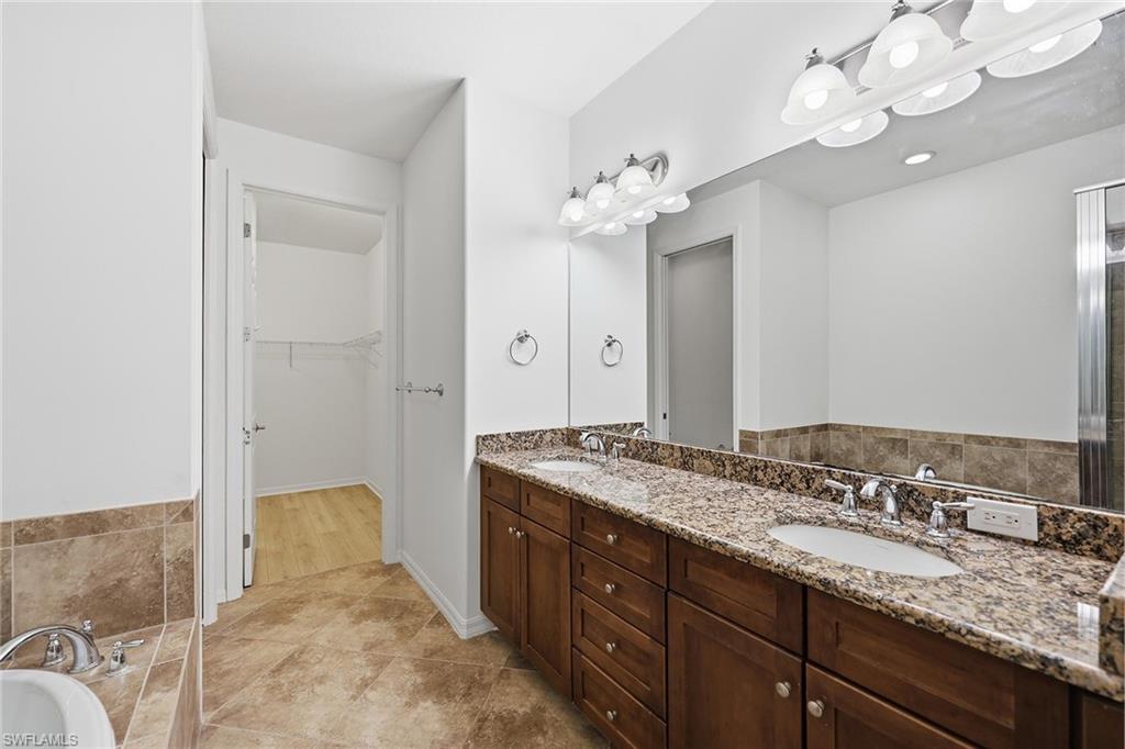 9037 Alturas Street, Unit 372 Naples, FL 34113 - Photo 18 of 35 Primary Bathroom