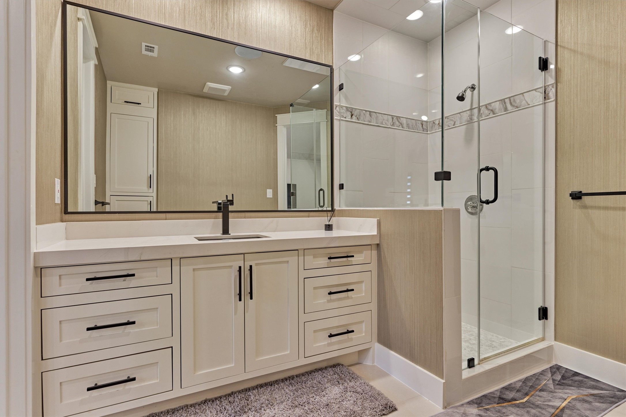 1907 Woerner Road Houston, TX 77090 - Photo 36 of 50 Shared bath between the two upstairs bedrooms features large vanity and walk-in shower.