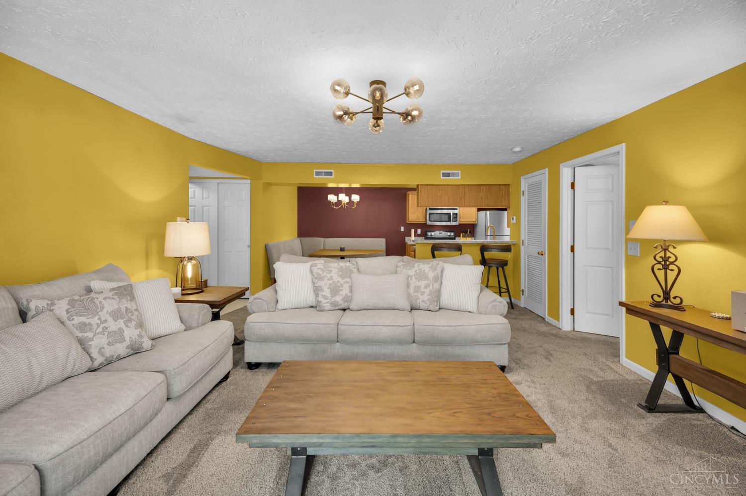 3543 Jessup Road, Unit 2B Cincinnati, OH 45239 - Photo 4 of 31 Bright open-concept living space with comfortable flow and abundant natural light in desirable Green Township condo