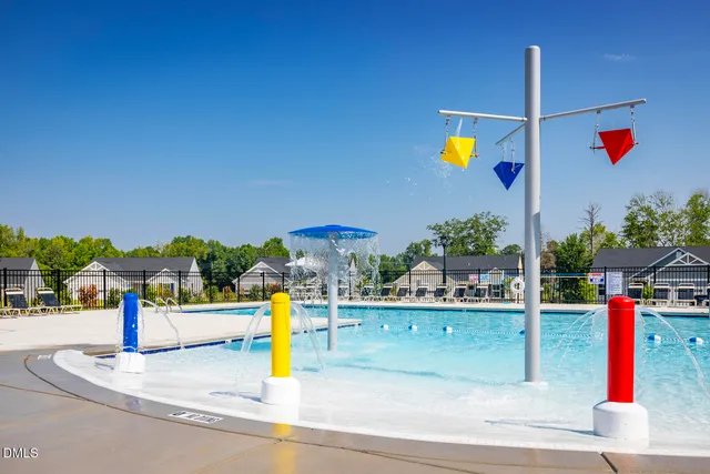 a front view of a house with swimming pool