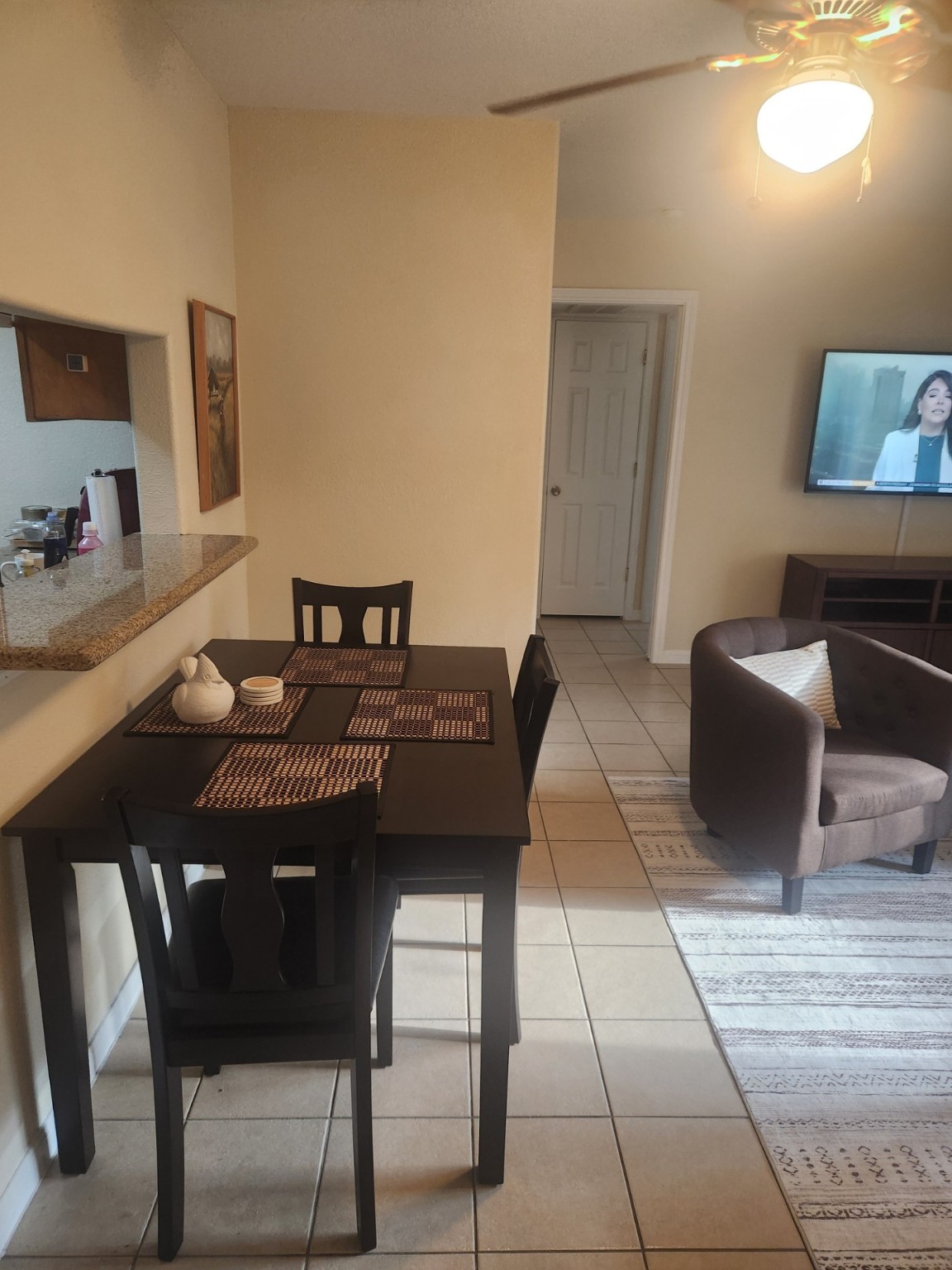 215 Postoffice Street, Unit 1005 Galveston, TX 77550 - Photo 5 of 16 a view of a dining room with furniture