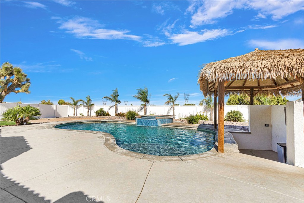 8621 Aster Road Oak Hills, CA 92344 - Photo 37 of 54 a view of a backyard