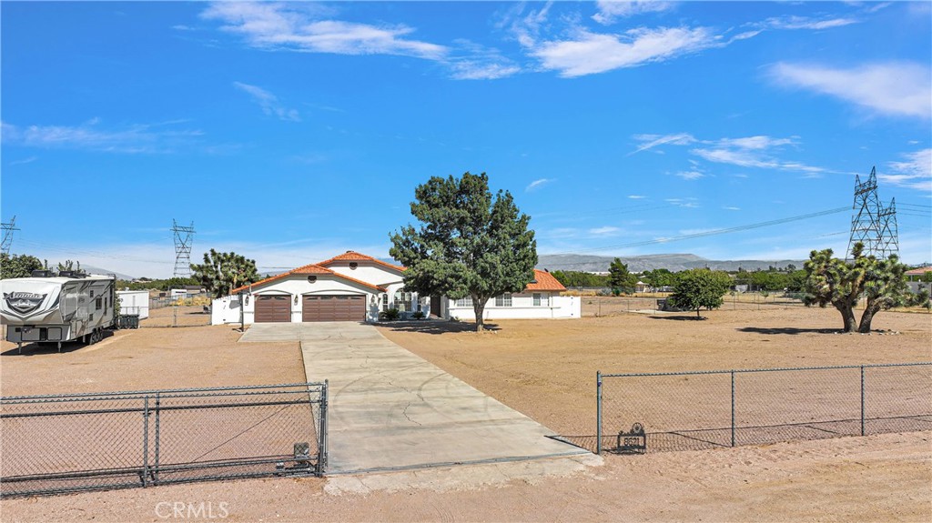 8621 Aster Road Oak Hills, CA 92344 - Photo 5 of 54 a view of a terrace view