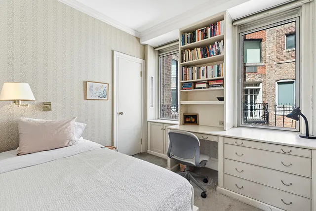 a bathroom with a sink a toilet and shower curtain